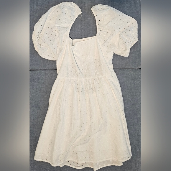 a new day Dresses & Skirts - A New Day White Eyelet mini dress smocked back detailing puffed sleeves. Size:L